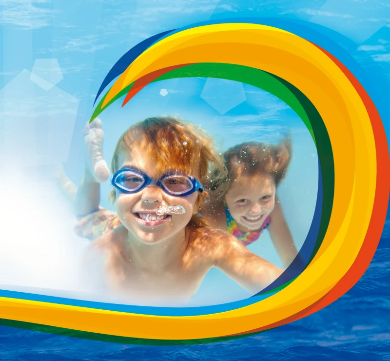 Kinder schwimmen durch bunte Unterwasserwelle